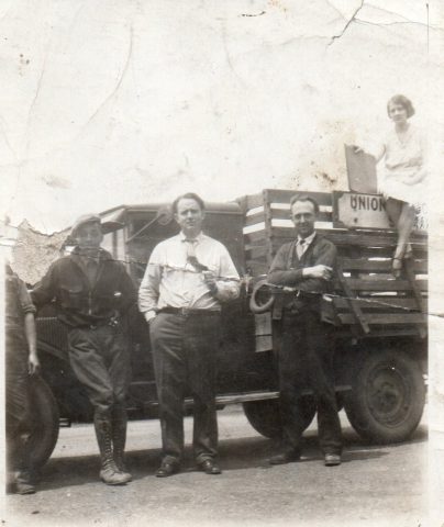 Union Stockyards. L-R: William "Bill" Keith, Jr. (manager), Unknown Man, Raymond Kleinhenz, Alfrida (Kleinhenz) Willke (sitting). Undated. Source: Nancy (Golubic) Kleinhenz